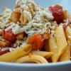 grated vegan cheese over pasta